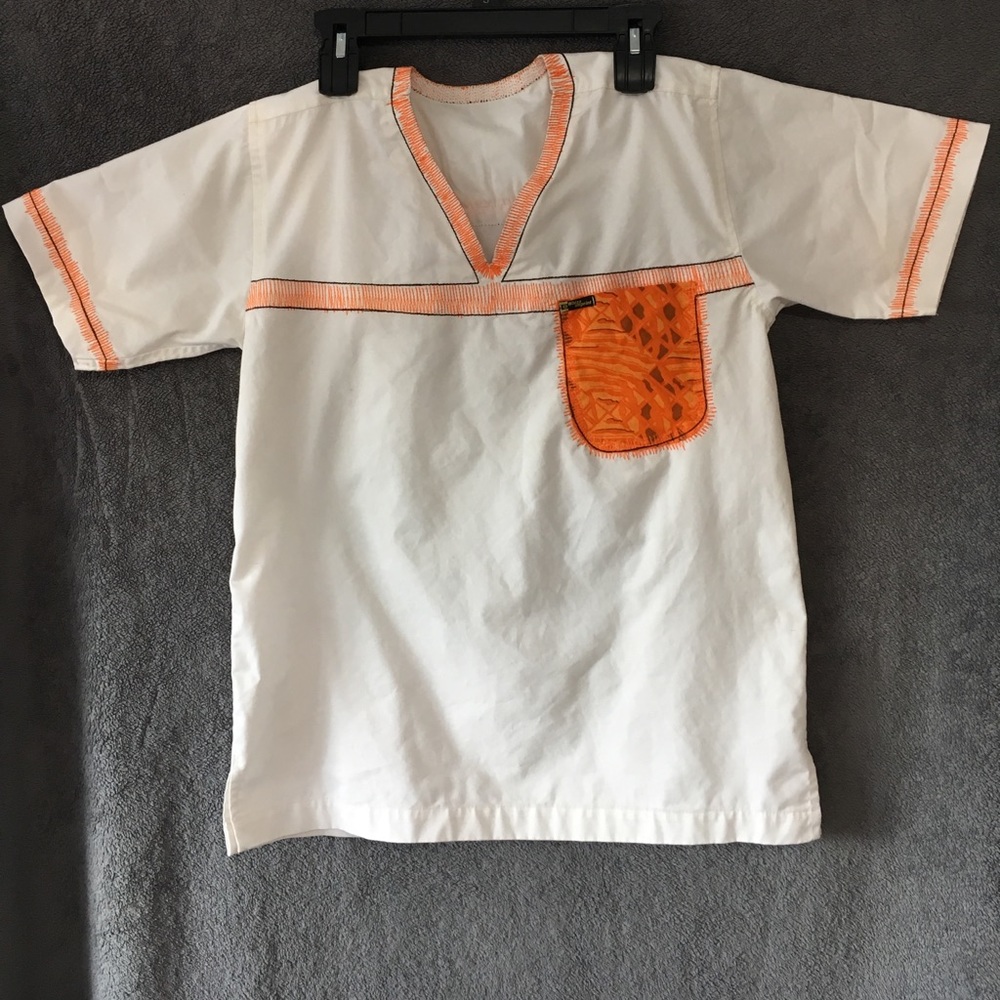 White and orange made in Ghana boys shirt.